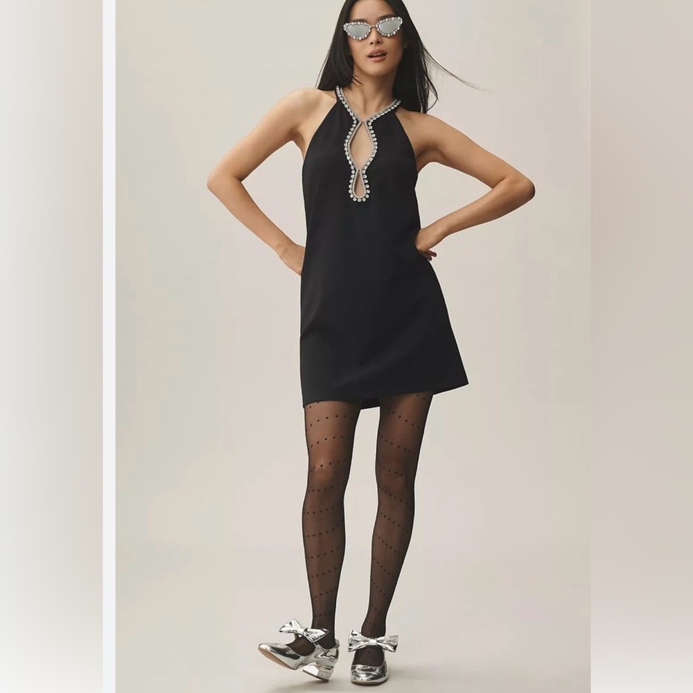 Mauve Anthropologie   Black Dress with Beaded Neckline
Size small
Like new